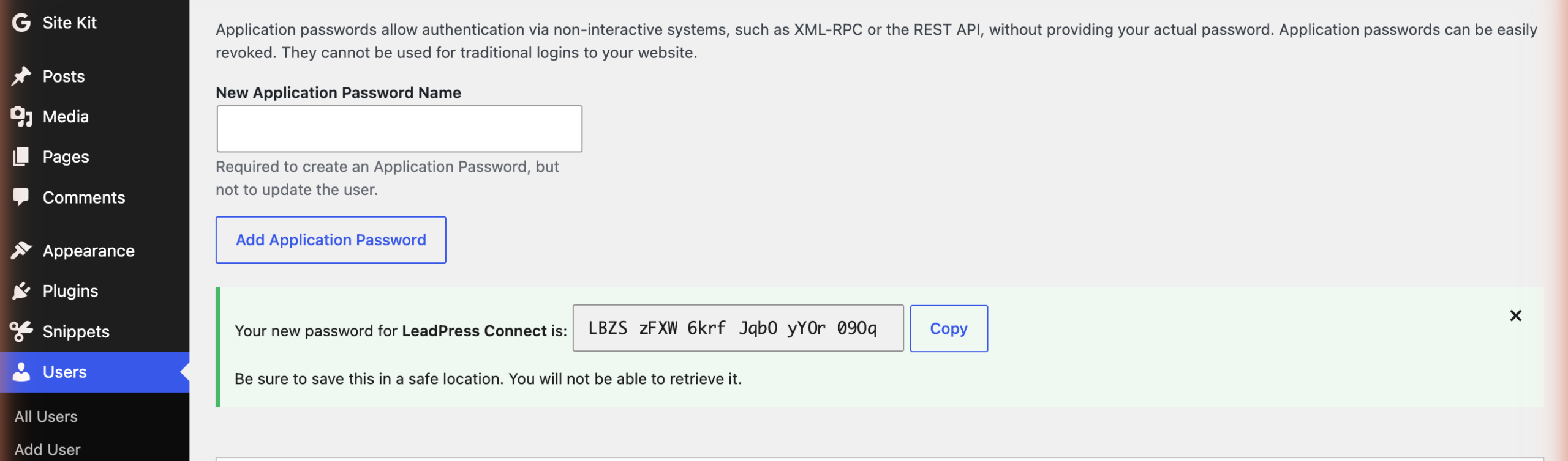 WordPress showing a newly generated application password in a green box with a Copy button
